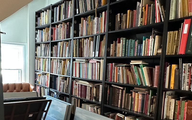 Large bank of bookshelves filled