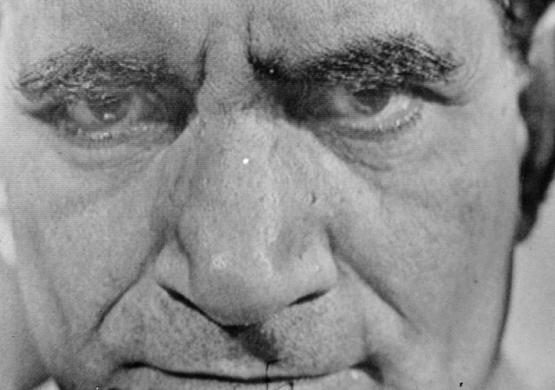 Kuda Bux extreme close up of his face, black and white
